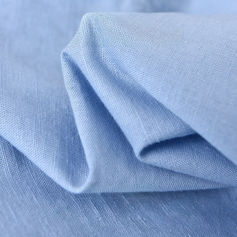 Modern fit men's shirt featuring a distinctive mandarin collar, a versatile long sleeve top.