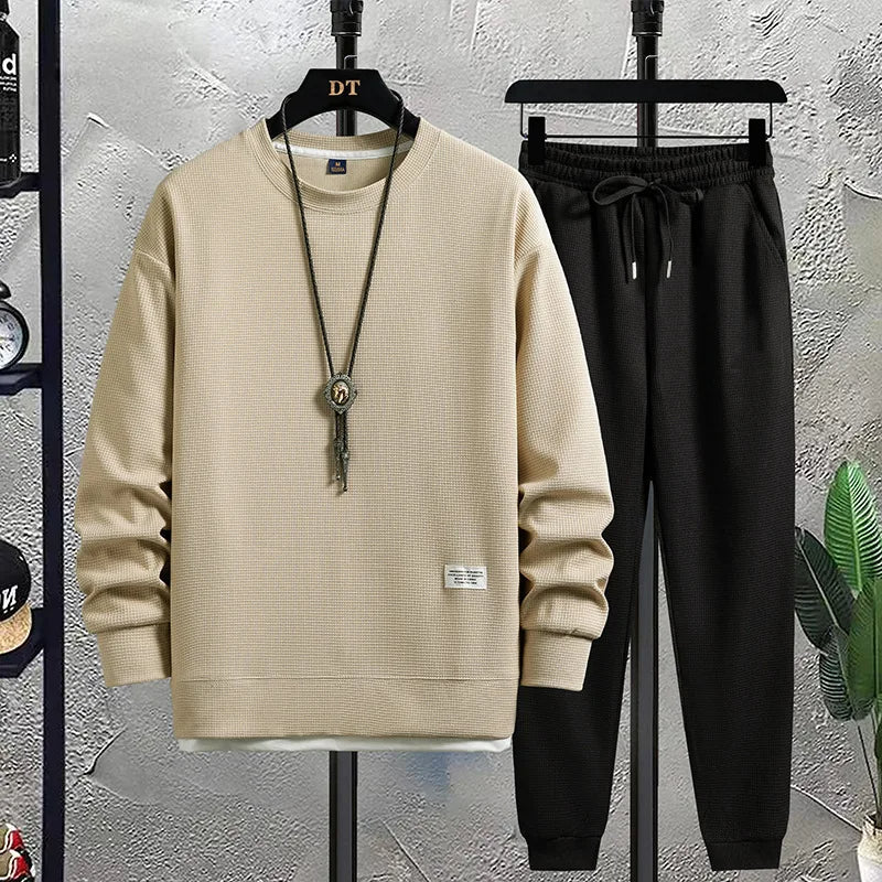 Two-piece men's lounge set in relaxed fit, ideal comfortable outfit for daily relaxation.