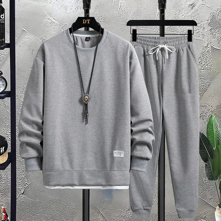 Meridian men's casual outfit, relaxed fit top & joggers, perfect for a cozy & comfortable day.