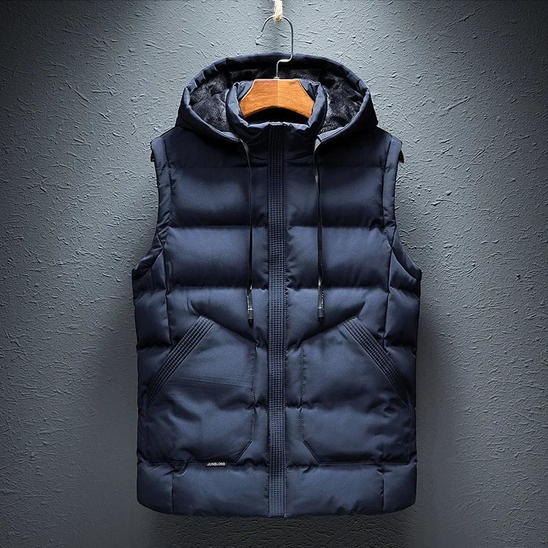 Men's Midtown Hooded Puffer Vest in black. Insulated, lightweight, and weather-ready for autumn & winter layering.
