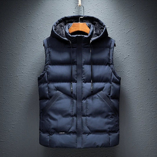 Men's Midtown Hooded Puffer Vest in black. Insulated, lightweight, and weather-ready for autumn & winter layering.