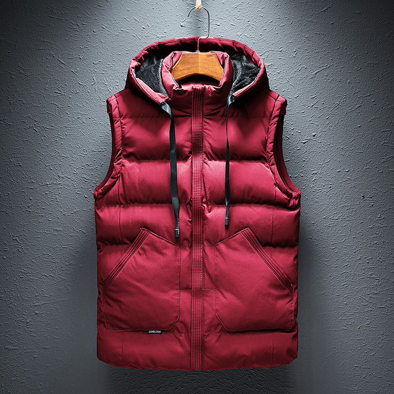 Zip-up men's insulated puffer vest with hood. Ideal lightweight outerwear for warmth, perfect for winter or autumn.