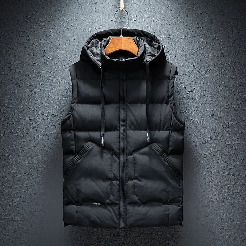 Midtown Men's Hooded Puffer Vest. A comfortable, weather-ready layering piece, great for men's casual winter wear.