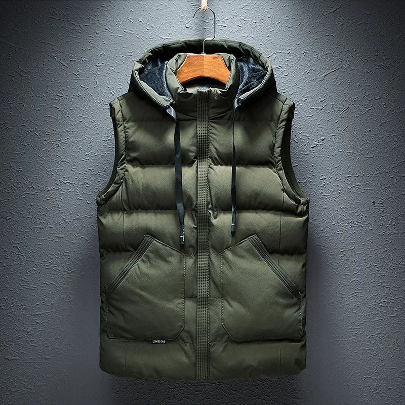 Men's fashionable insulated hooded puffer vest. Lightweight & comfortable for year-round layering, a must-have vest.