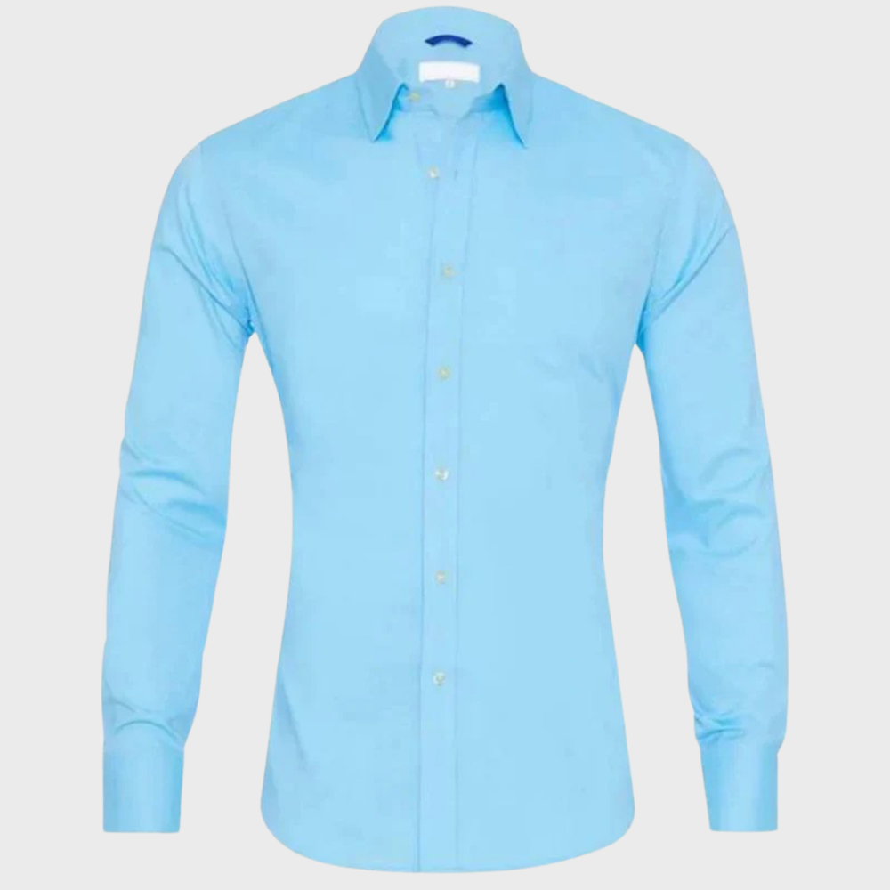 Man wearing a crisp Milan wrinkle-free shirt in an office setting, exuding professional men's style.