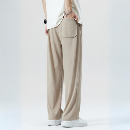 Stylish men's Milano pleated casual trousers with comfortable elastic waist for everyday wear.