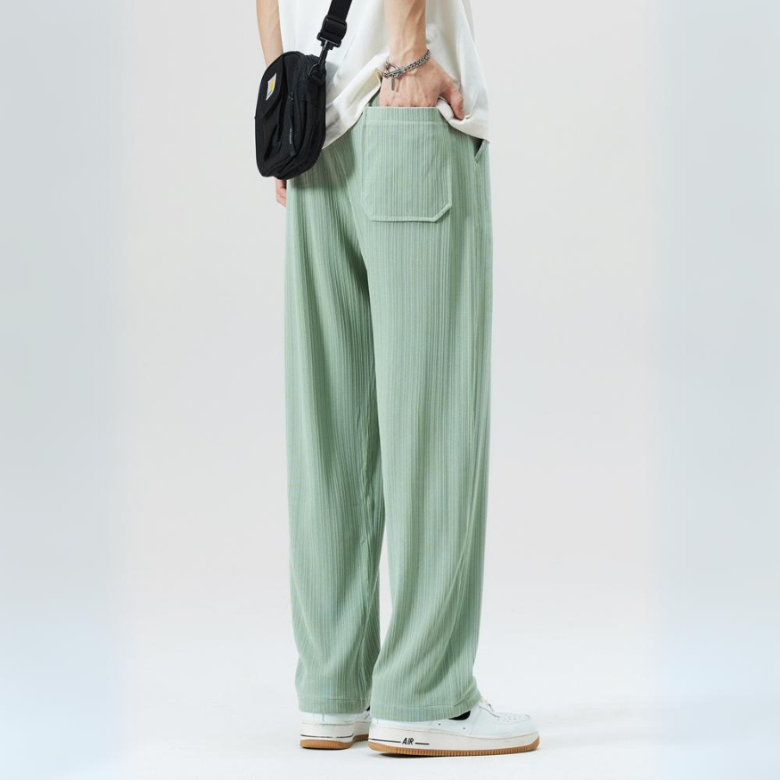 Relaxed fit men's Milano pleated trousers, elastic waist for ultimate casual comfort and style.