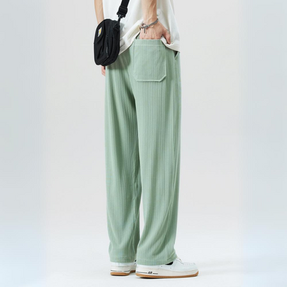 Relaxed fit men's Milano pleated trousers, elastic waist for ultimate casual comfort and style.