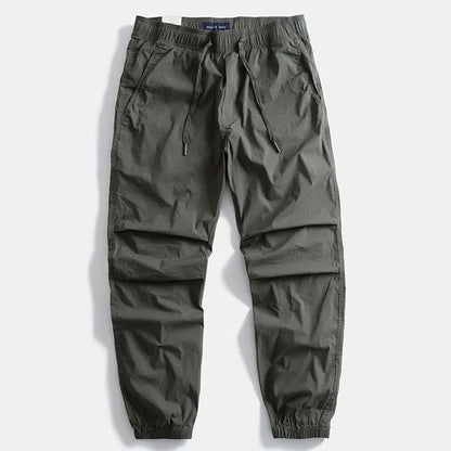 Men's Milo gray cargo pants: ultimate comfort & versatile style for everyday wear, travel & outdoor activities.