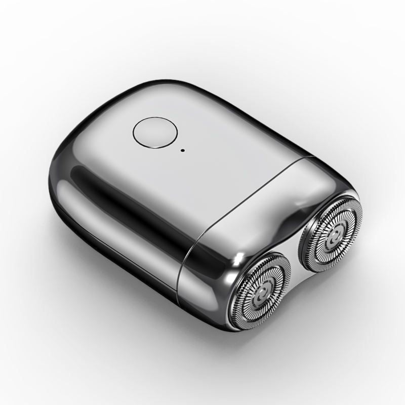 Portable men's electric razor, rechargeable & waterproof, ideal for travel & personal care.