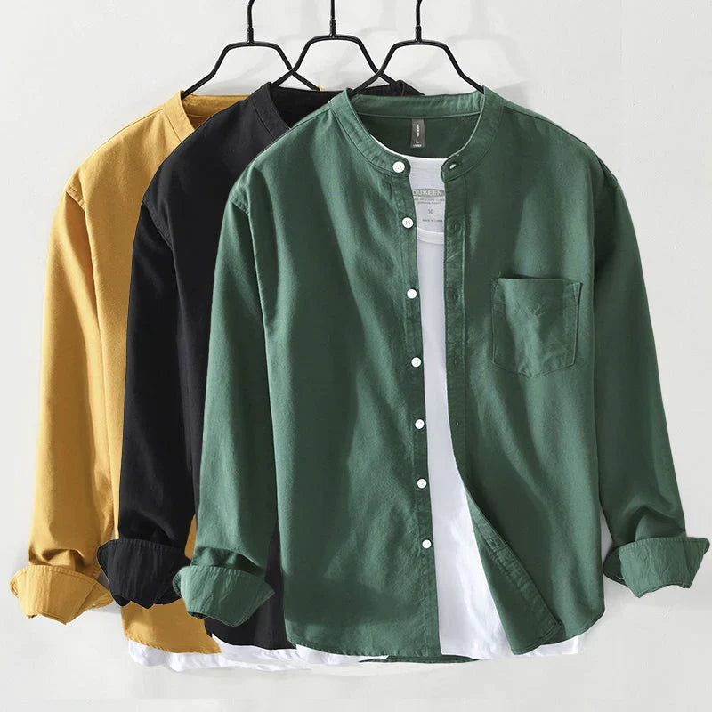 Stylish men's band collar shirt with a minimalist design. Relaxed fit, lightweight fabric, ideal for modern casual outfits.