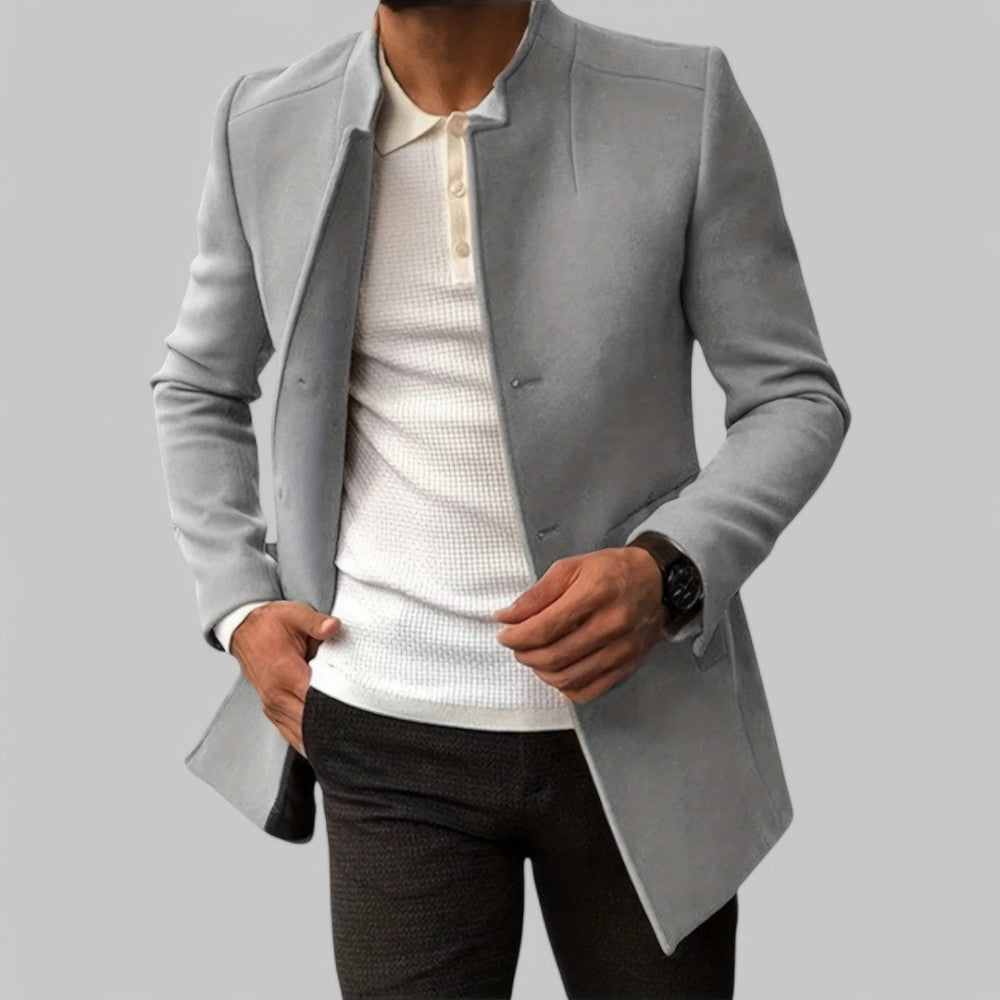 Sophisticated men's trench coat, minimalist button style, perfect smart casual tailored outerwear.