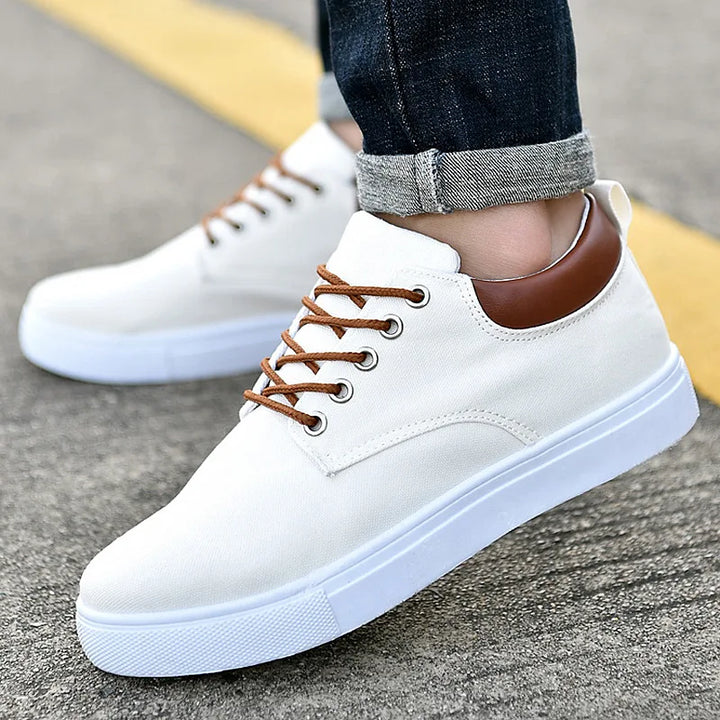 Versatile men's minimalist footwear, combining comfortable slip-on design with a sleek casual dress shoe look.