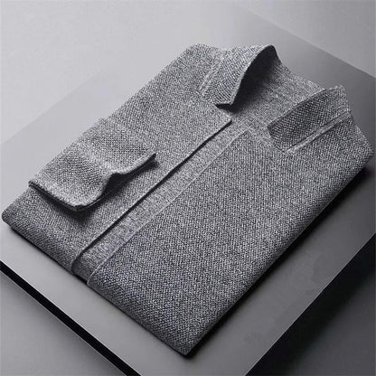 Effortless gray men's collarless cardigan, a sleek layering piece for modern minimalist smart casual fashion.
