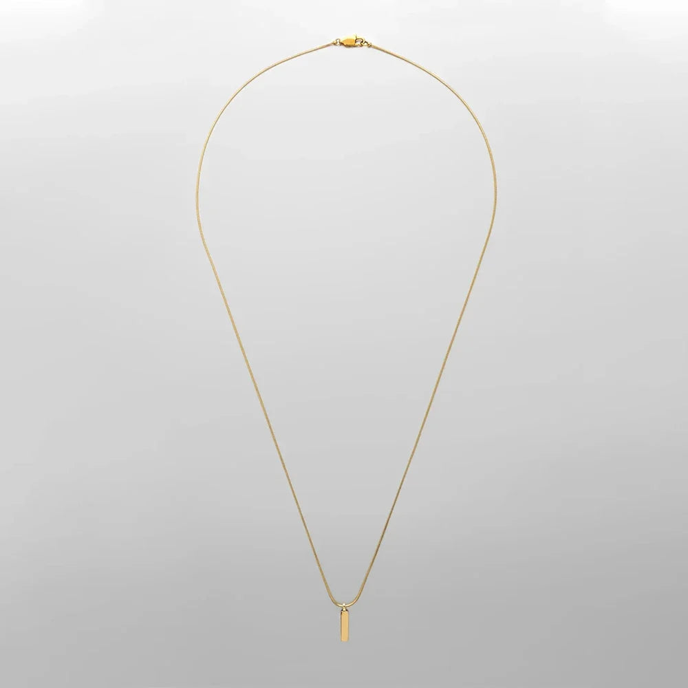 Clean and simple men's minimalist bar pendant necklace in durable stainless steel. Modern jewelry.