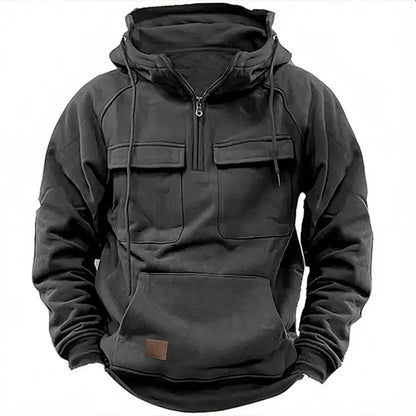Detail view of Men's Mission Quarter-Zip Hoodie, highlighting cargo pockets and comfortable fabric.