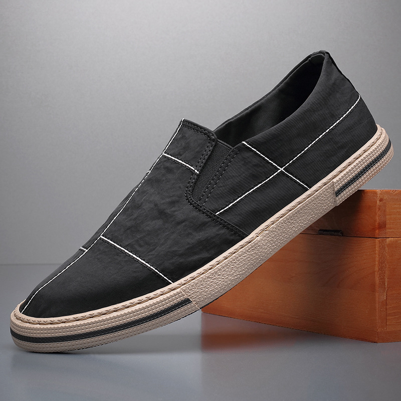 Modern art inspired men's slip-on shoes, breathable, comfortable, casual style.