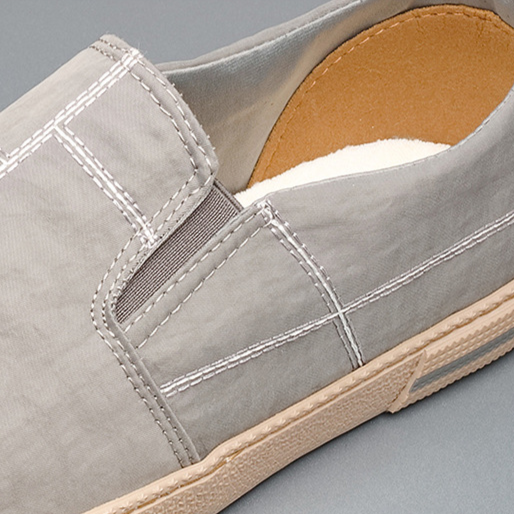 Casual men's slip-on shoes, modern art pattern, lightweight & breathable for daily comfort.