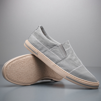 Comfortable men's slip-on shoes, modern art aesthetic, perfect for summer.