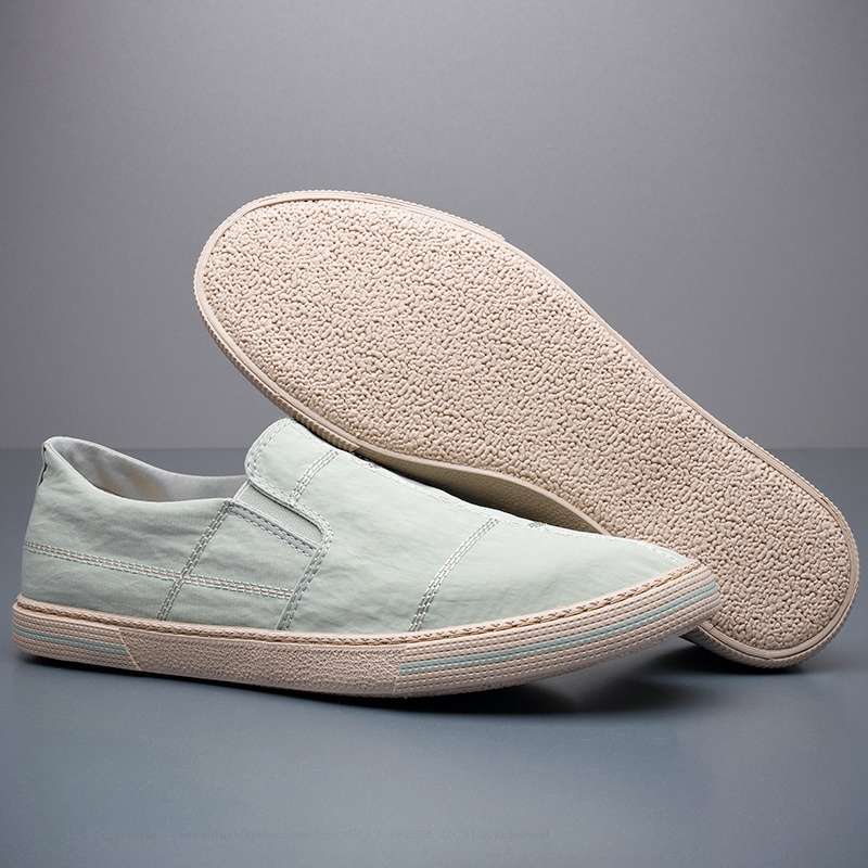 Stylish men's lightweight slip-on footwear, modern art pattern, casual & comfortable.
