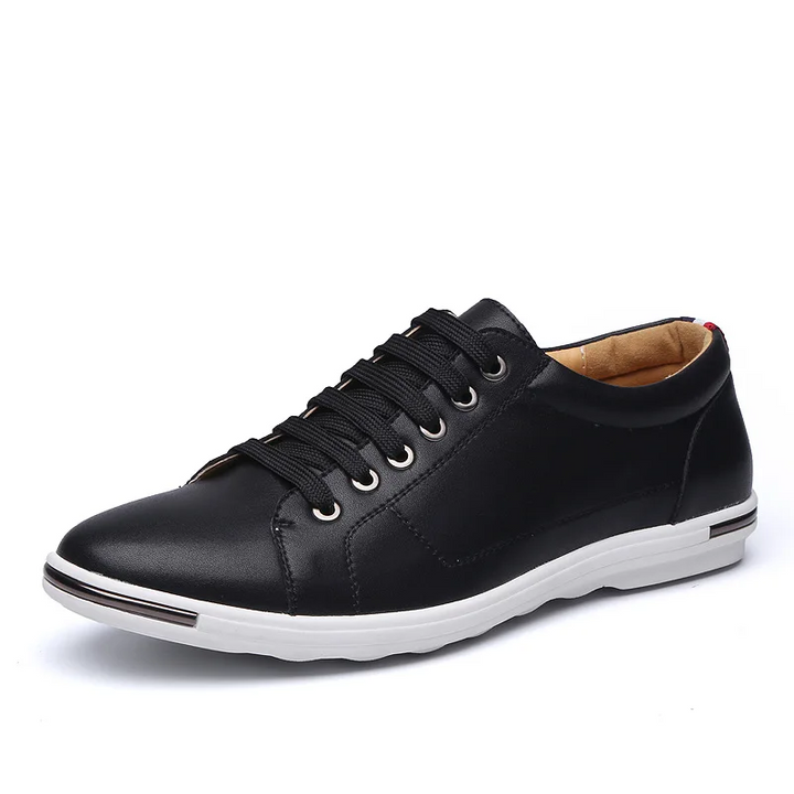 Stylish men's black casual sneakers, perfect for modern everyday comfort and versatile fashion.