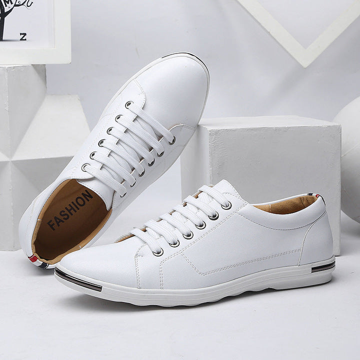 White modern men's sneakers, ideal for stylish everyday wear and walking comfort.
