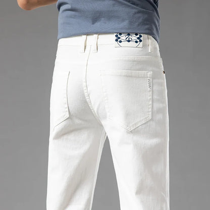 Men's modern fit stretch denim jeans in a classic blue wash, perfect for casual everyday wear.