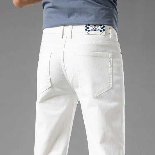 Men's modern fit stretch denim jeans in a classic blue wash, perfect for casual everyday wear.