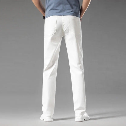 Clean white men's modern fit stretch denim jeans, a fresh option for contemporary casual outfits.
