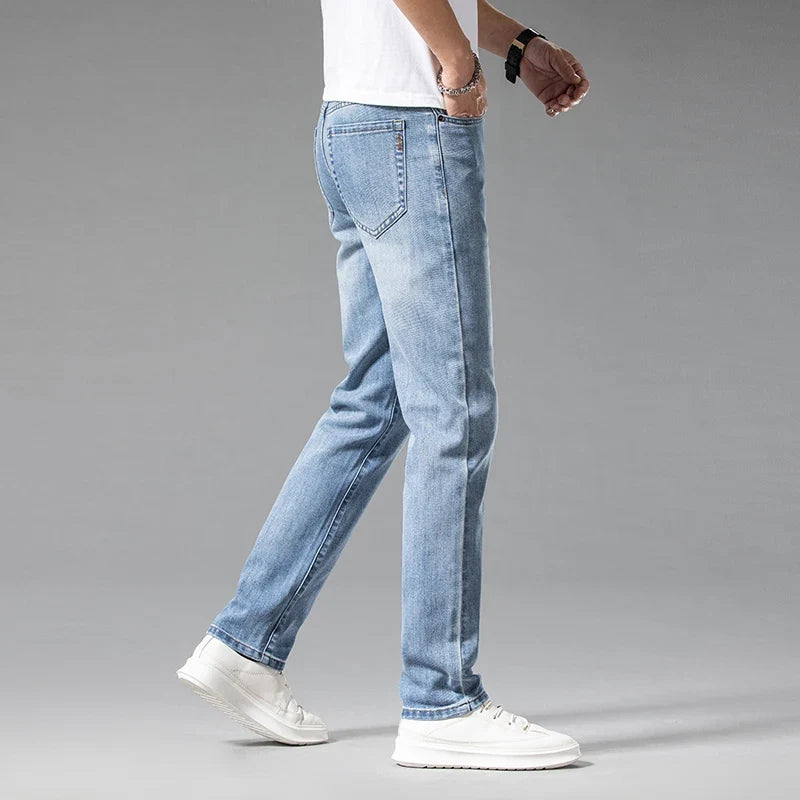 Versatile men's blue stretch denim jeans, modern fit, easily styled for various casual occasions.