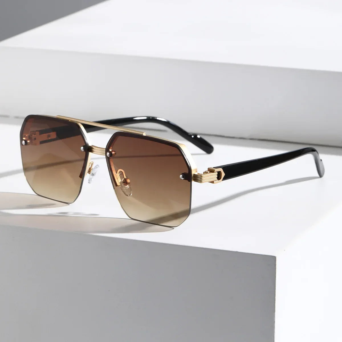 Men's geometric UV protection sunglasses with stylish gradient lenses. Modern design, available in onyx black.