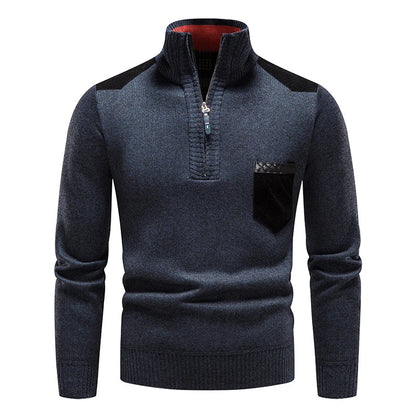 Front view of a men's stylish half-zip sweater with modern accents, great for layering.