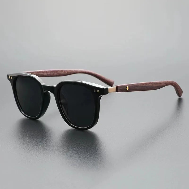 Men's modern Harbor View sunglasses with stylish wood accents. Black/grey frames offer UV protection & classic fashion.