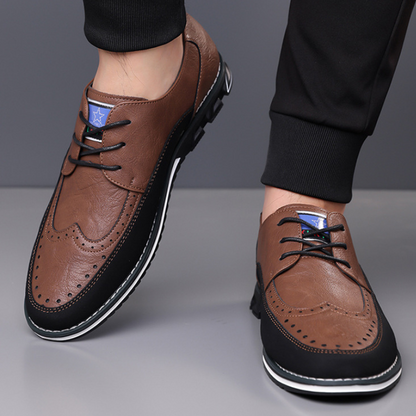 Black men's dress shoes, modern hybrid design for comfort & stylish smart casual wear.