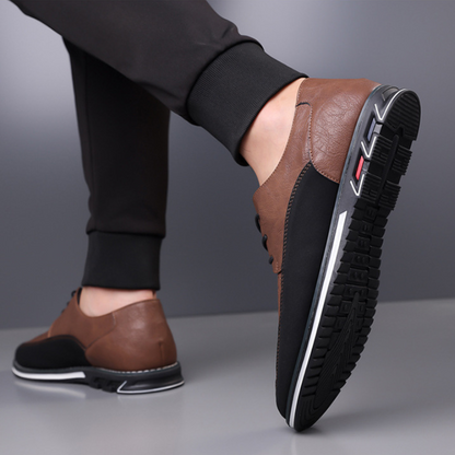 Brown men's hybrid brogue shoes, offering all-day comfort for office and versatile events.