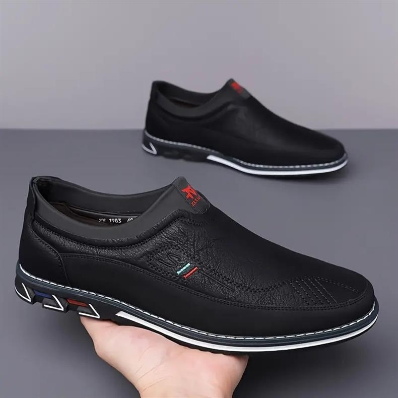 Top view of men's cushioned comfort loafers, modern hybrid design for versatile daily footwear.