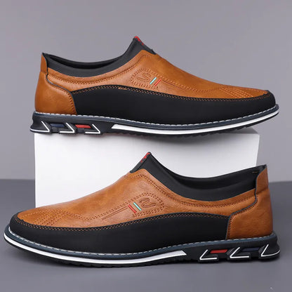 Close-up of men's modern hybrid loafers, showcasing texture and cushioned comfort features.
