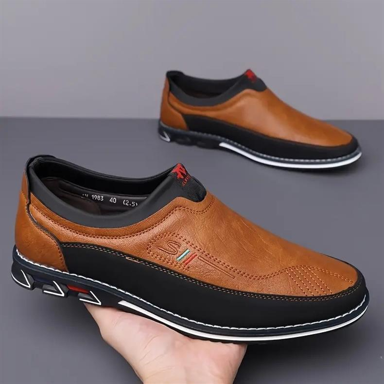 Back view of men's cushioned comfort loafers, ideal slip-on footwear for everyday dress & casual style.