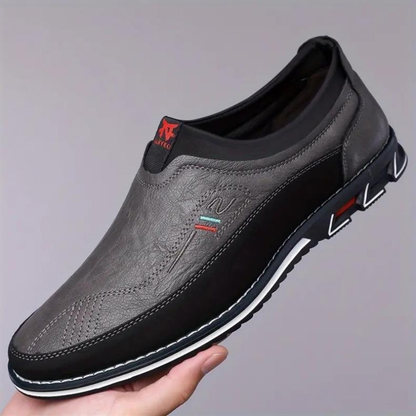 Cushioned men's comfort loafers, a modern slip-on dress shoe for all-day versatile wear.