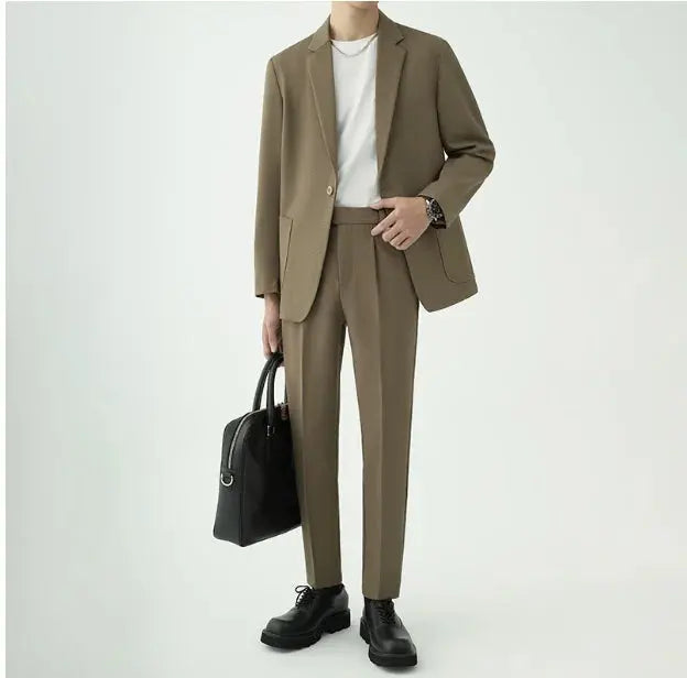 Classic men's formal wear: a sophisticated two-piece suit with a minimalist design for special occasions.
