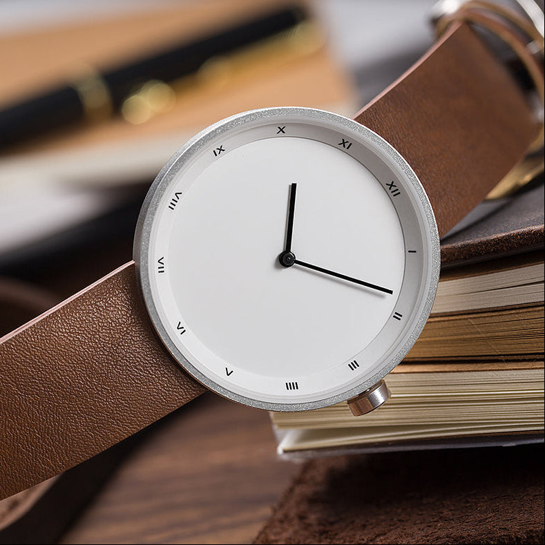 Classic men's dress watch with minimalist design, perfect for everyday wear.
