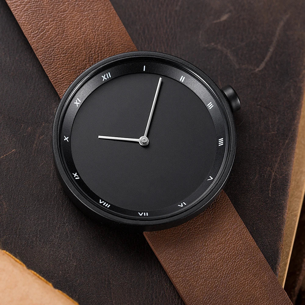 Modern minimalist men's watch with a durable stainless steel case and a sophisticated look.