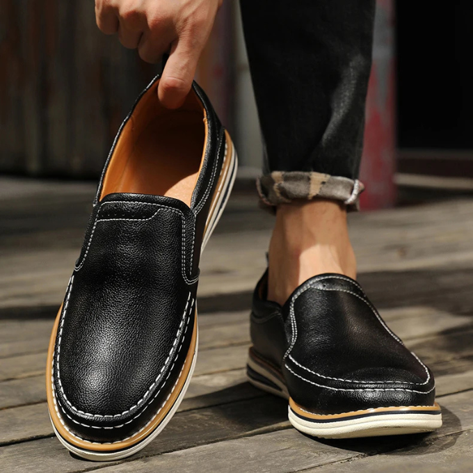 Men's moc toe loafers with distinctive stitching, comfortable slip-on smart-casual footwear for versatile style.