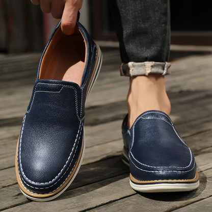Side view of sleek men's moc toe slip-on loafers, showcasing their modern design and smart-casual appeal.