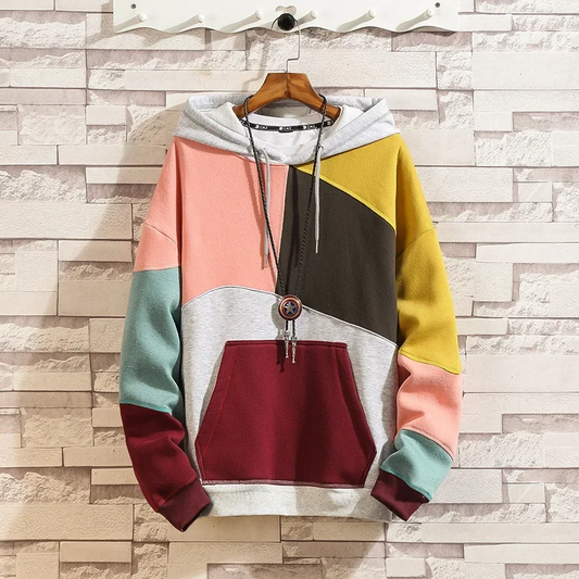 Men's modern patchwork hoodie, multi-fabric design. Stylish hooded sweatshirt for casual wear & streetwear comfort.