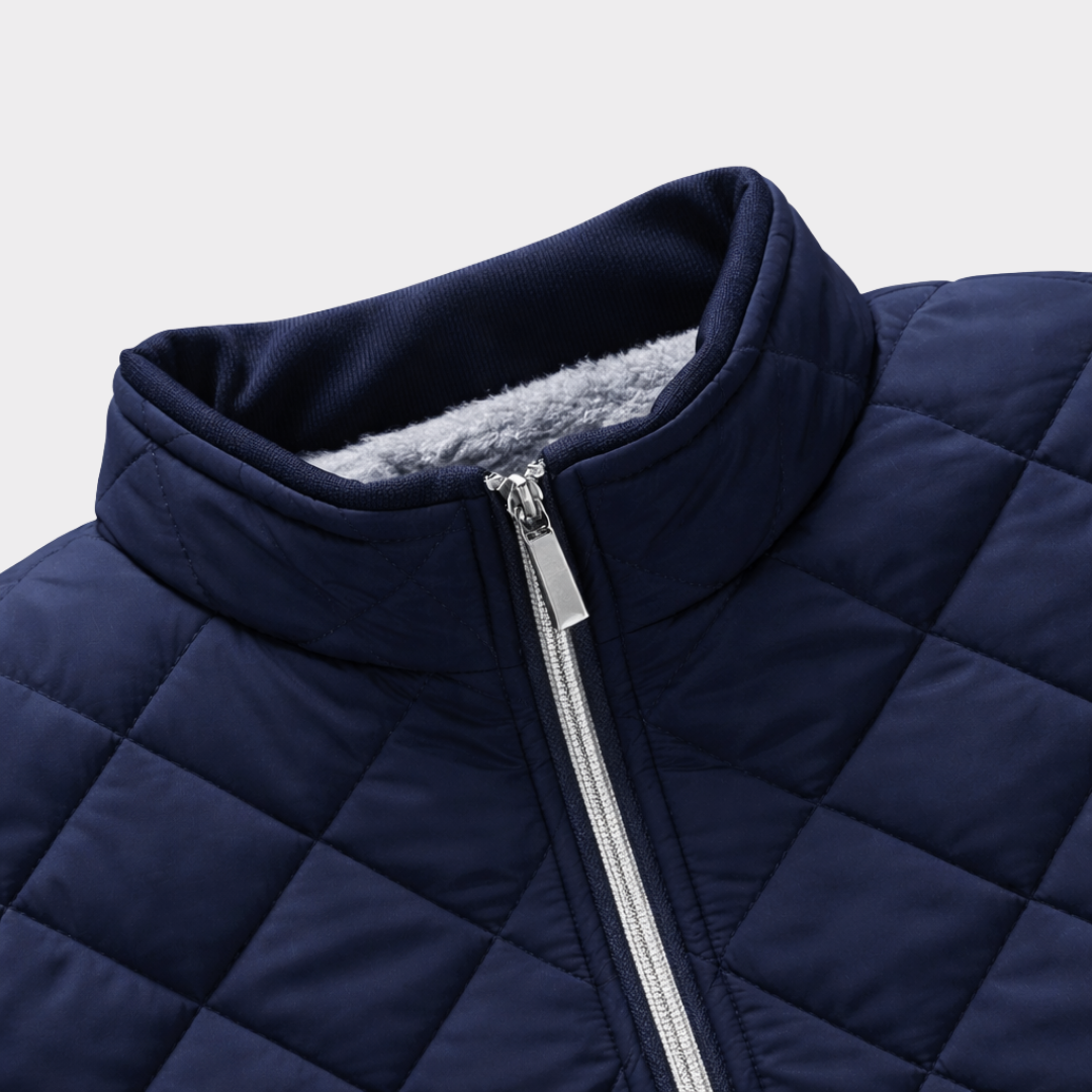 Durable men's quilted jacket with a modern design, providing warmth & style for versatile fall & winter everyday wear.