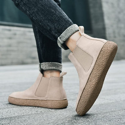 Grey men's modern Chelsea boots, offering superior orthopedic comfort & a sleek look.