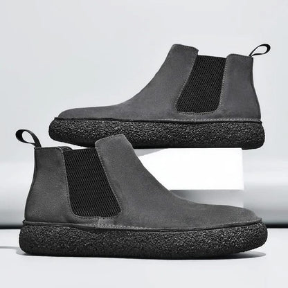 Durable brown men's modern Chelsea boots, perfect for casual outings or semi-formal events.