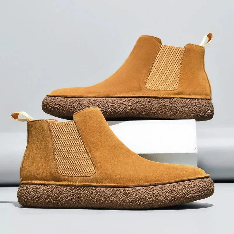 Modern men's Chelsea boots, blending dressy appeal with casual comfort & timeless style.