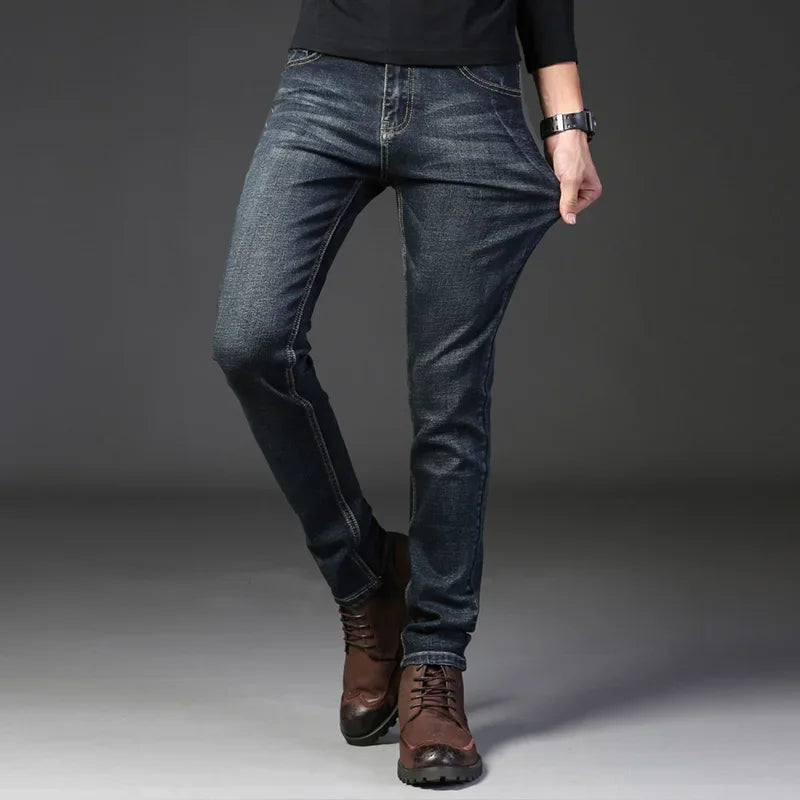 Stylish men's slim fit washed blue jeans for everyday casual wear. Comfortable stretch denim.